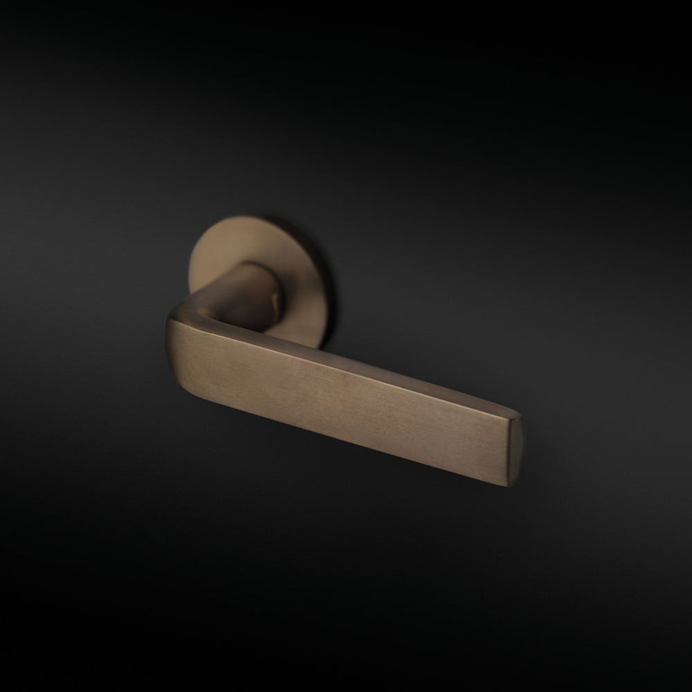 Design handtag från FSB i brons