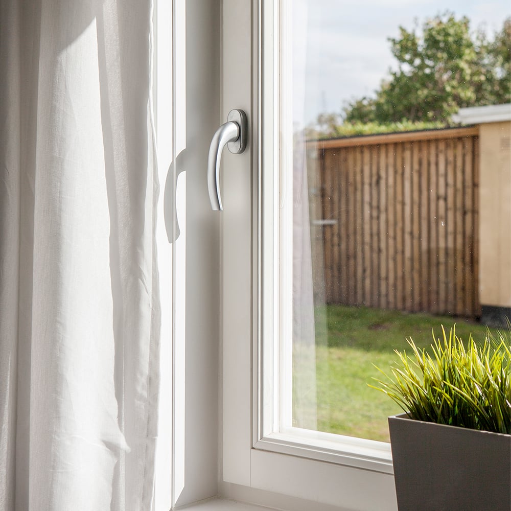 Inward-opening wooden windows with standard handle