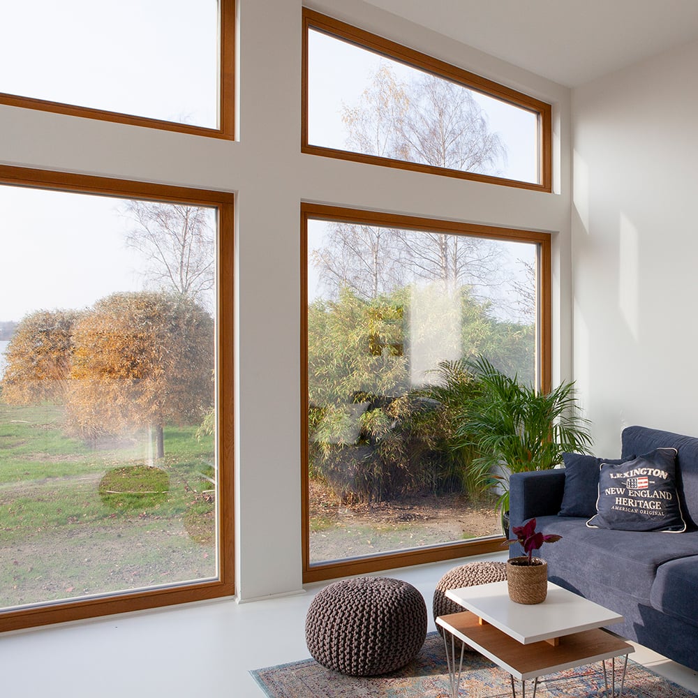 Fixed wooden windows in solid oak with transparent stain