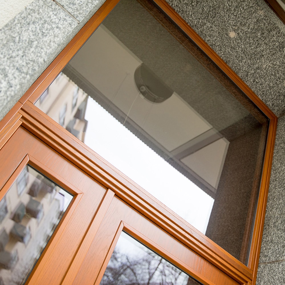 Overhead light in solid oak transparent stained for oak entrance door from Ekstrands