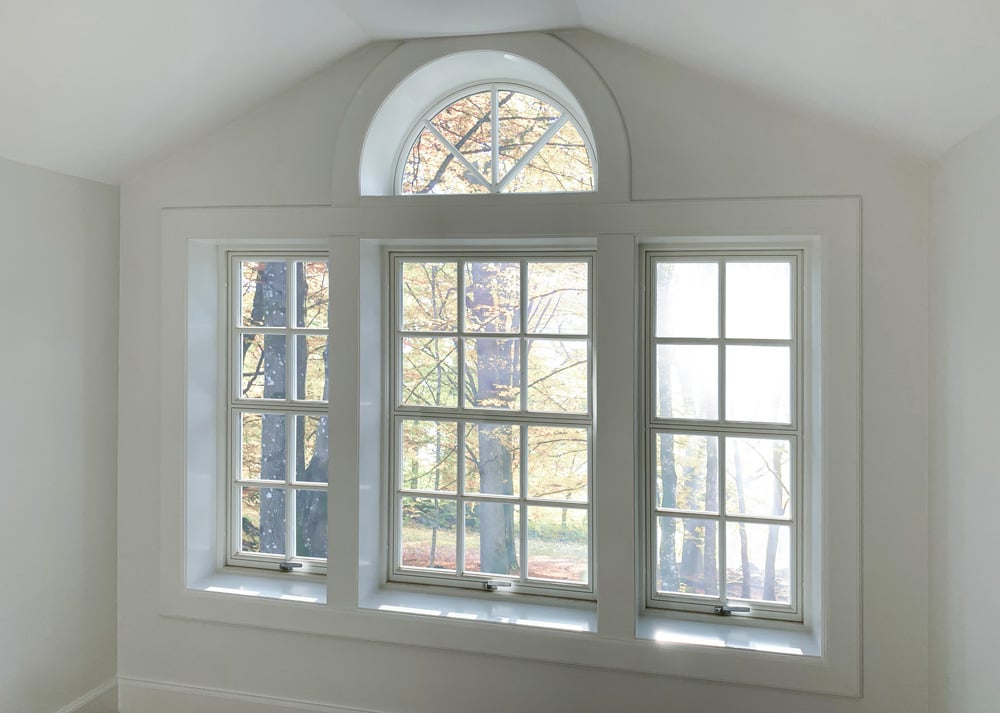 Wooden windows Tradition with astragals and semi-circular windows with astragals