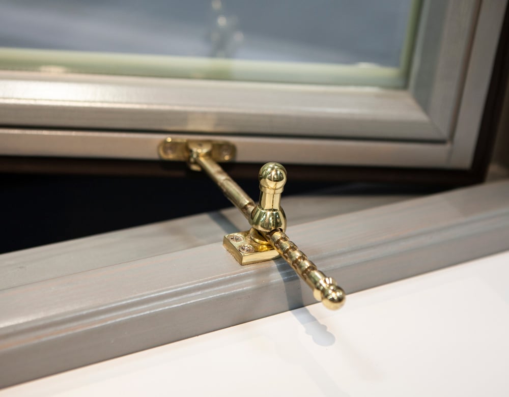 Brass ventilation fittings. Optional for outward-opening windows. Also available in chrome.